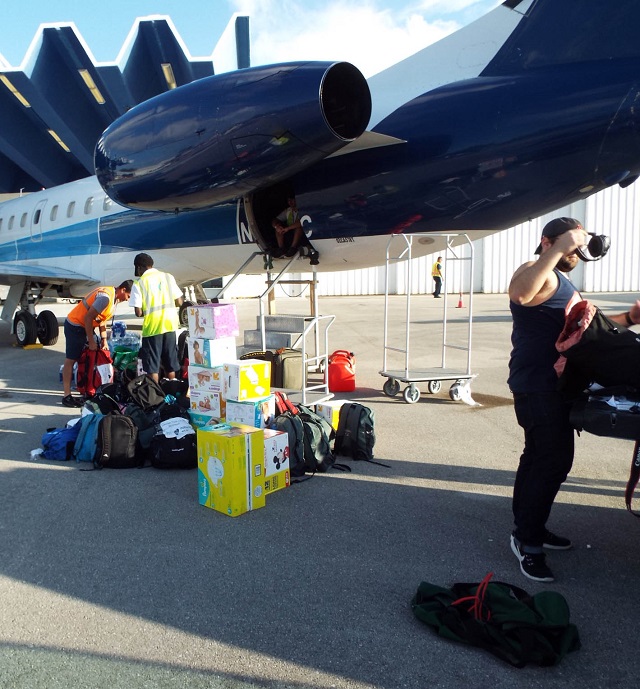 Student Prepares Third Relief Flight to Puerto Rico after Raising