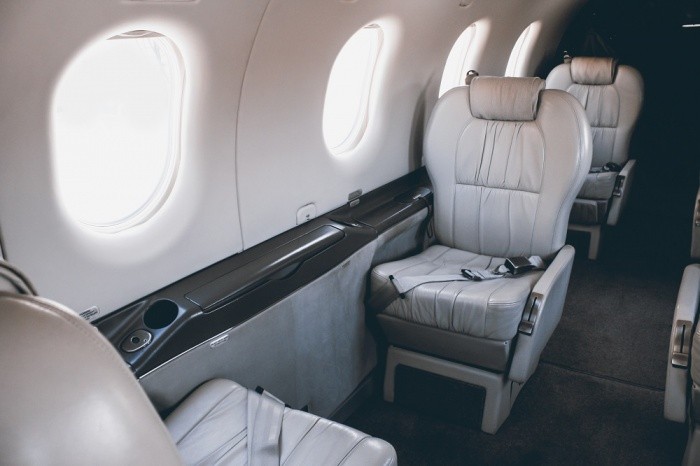 First Class vs. Private Jets